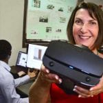 Dr Beidel holding VR headset