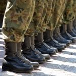 Military personnel lined up_